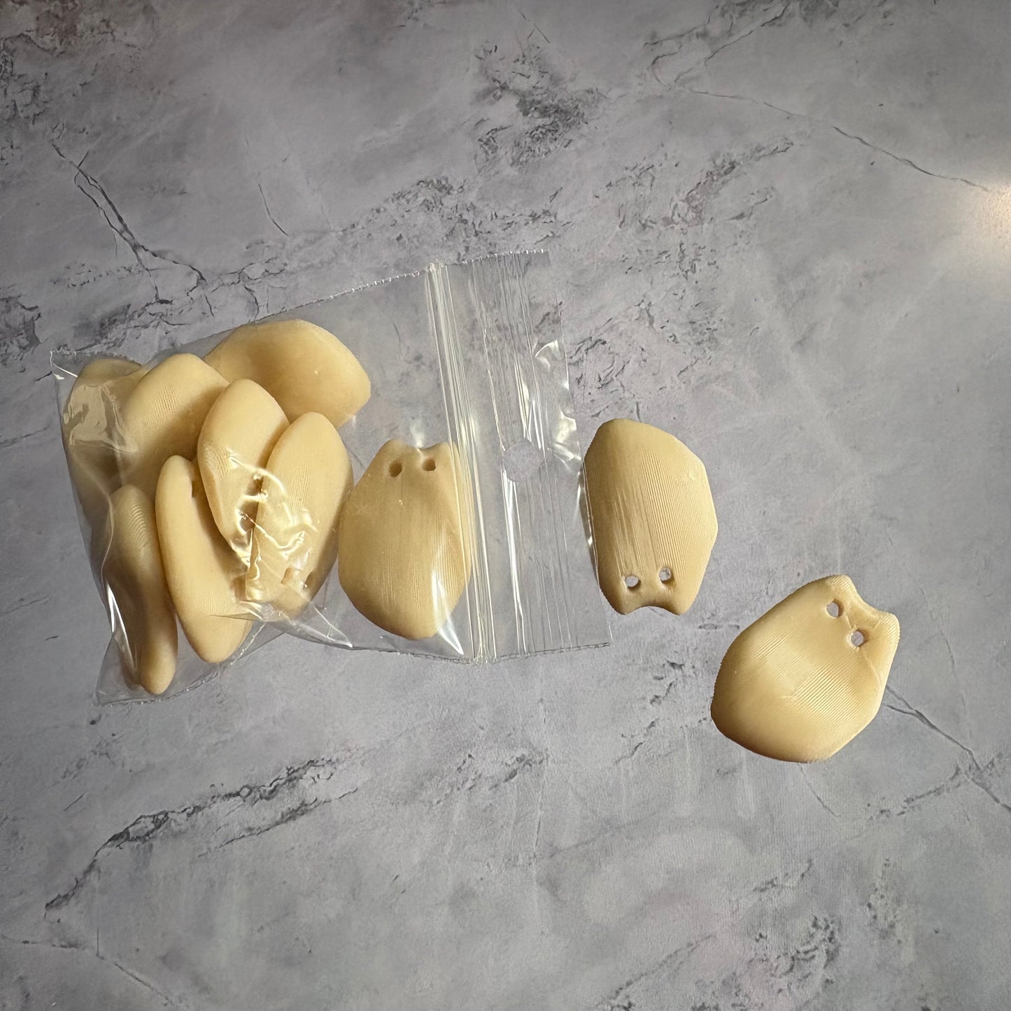 Elk Teeth inspired 3D printed pieces